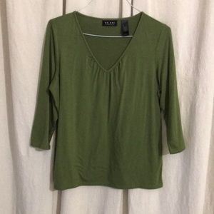 Bright green vee neck tee.